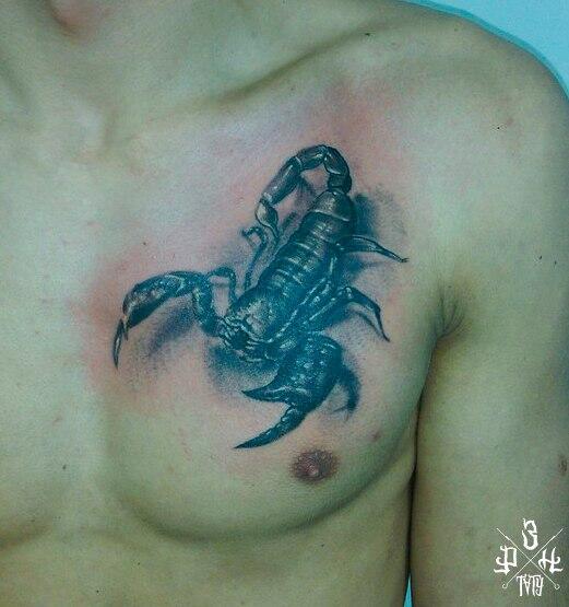 Фото тату Тату скорпионы на груди
