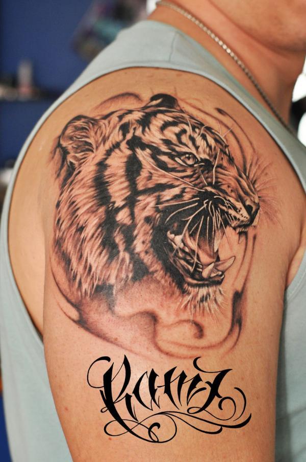 Татуировки мужские на плече тигр