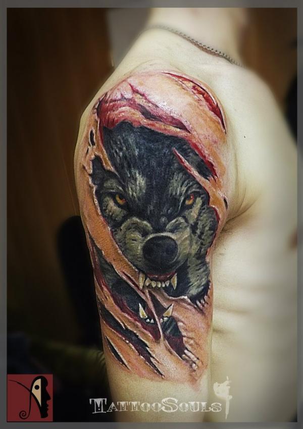 Символика татуировки оскал волка на плече