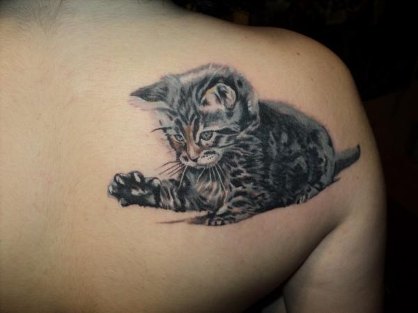 Фото тату Играющий котенок