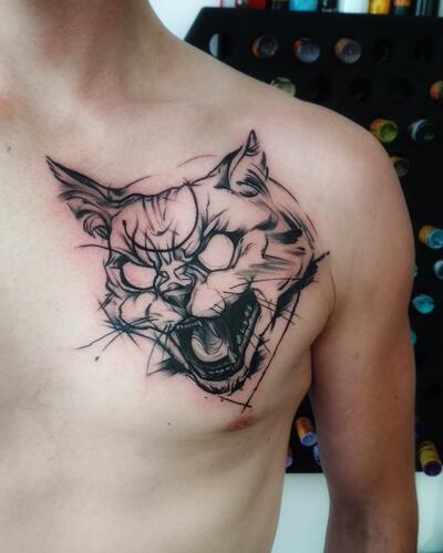 Татуировки кошек на груди для девушек