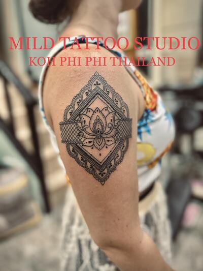 Mandala tattoo at mild tattoo 