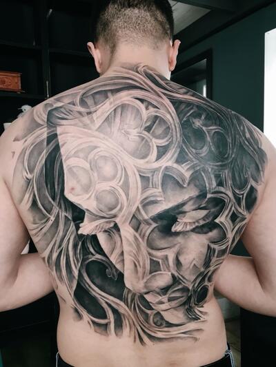 Мужские татуировки на спине
