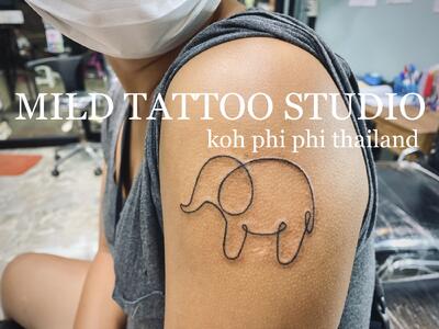 Elephant tattoo bamboo tattoo 