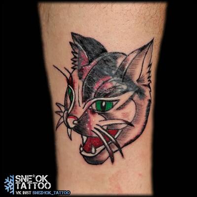 татуировка кошка